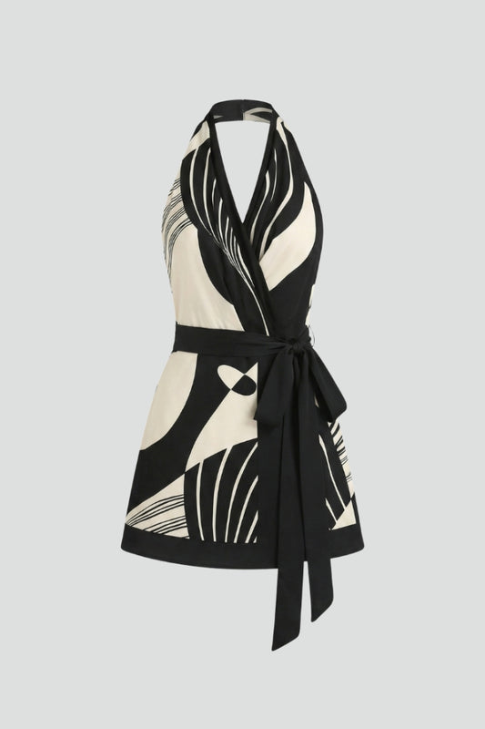 Women's halter wrap mini dress with tie waist. Flattering sleeveless design for summer fashion, perfect for casual wear.
