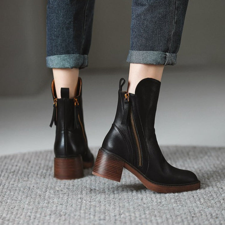Womens ankle high heel boots, zipper closure, and shock-absorbing sole for comfortable chic style.