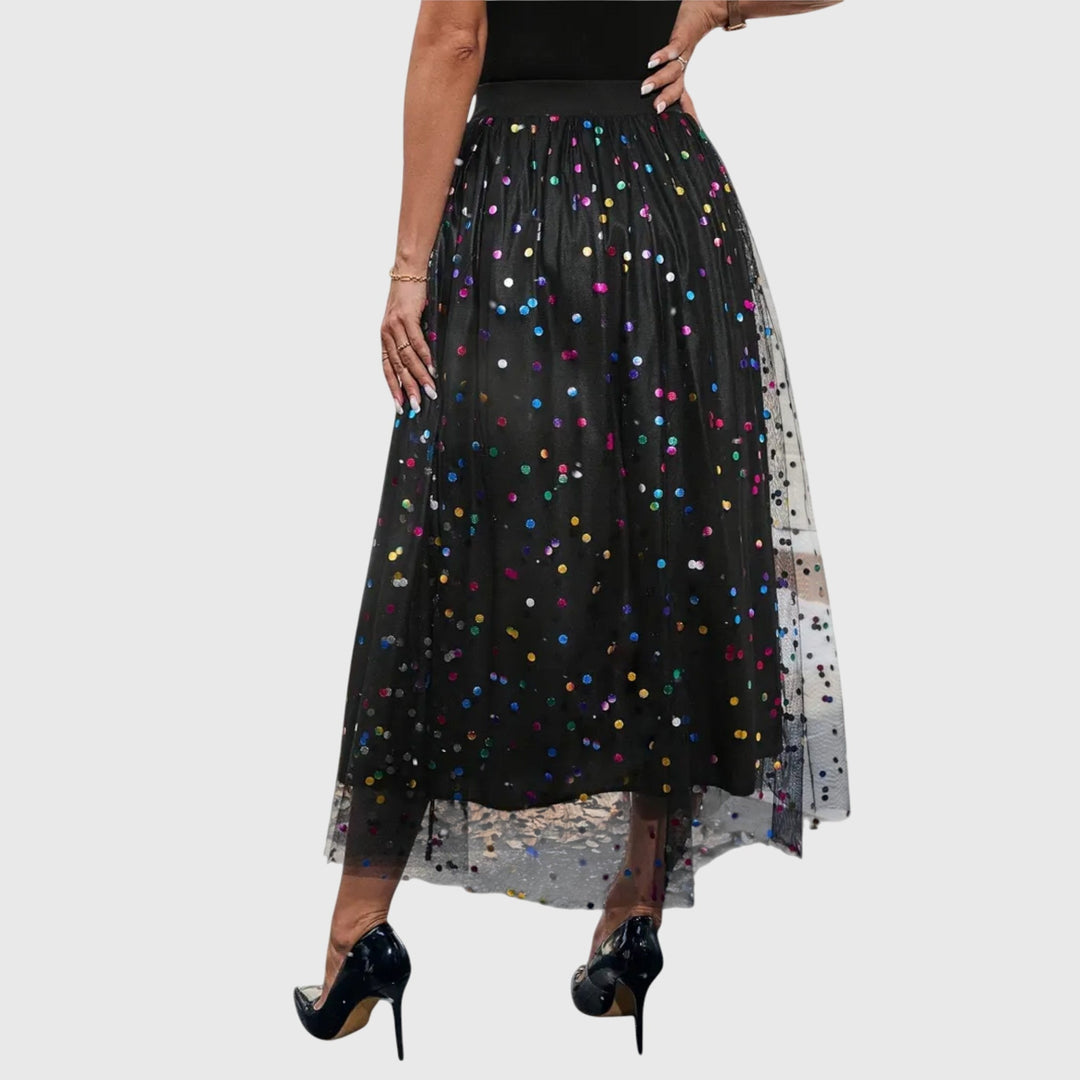 Elegant women's black sequin high-waist midi skirt with an asymmetric hem, styled for a special occasion outfit.
