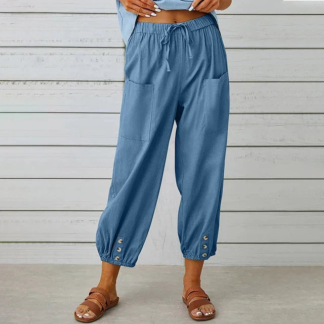 Comfortable women's ankle trousers with high waist and adjustable drawstring.