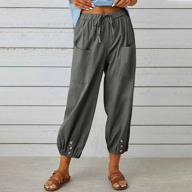 Casual women's pants: high waist, drawstring, ankle-length design for everyday style.