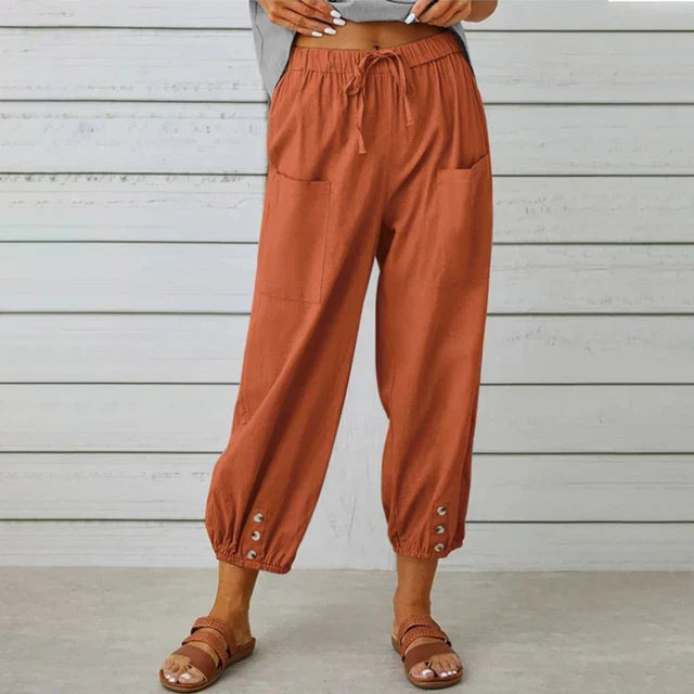 Everyday women's pants: high waist, comfortable drawstring, and stylish ankle cut.