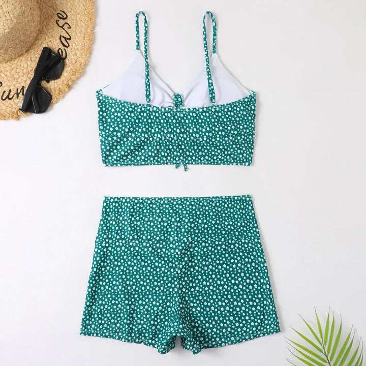 Chic two-piece high-waist floral bikini for women, supportive and stylish pool wear.