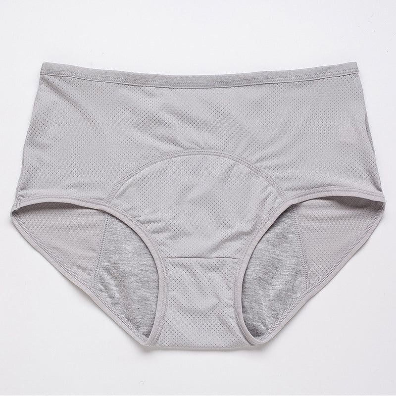 Flat lay of high waist period underwear with hygiene products, emphasizing leak protection