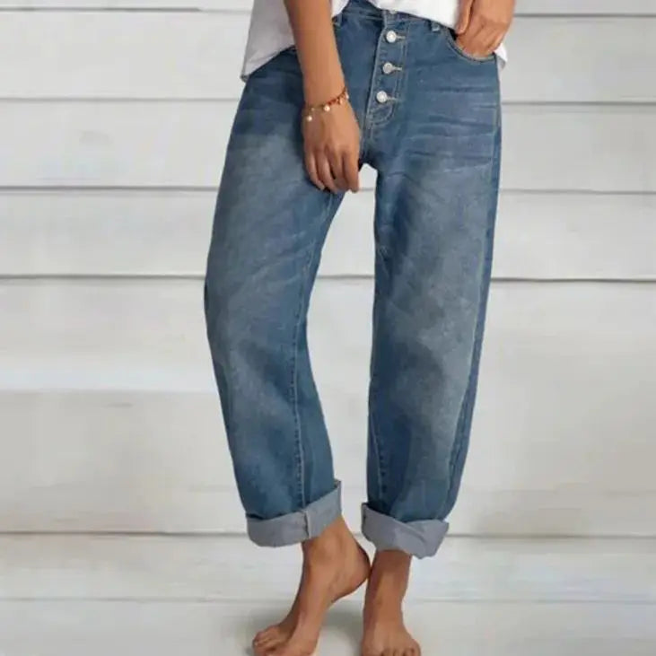 Casual women's button-front blue jeans in a relaxed fit, ideal for everyday comfort and style.