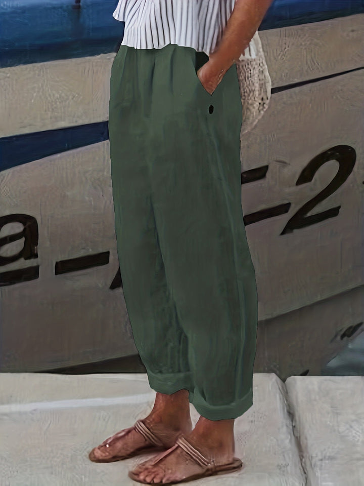 Solid color women's comfortable high waist pants for relaxed beach outfits & summer style.