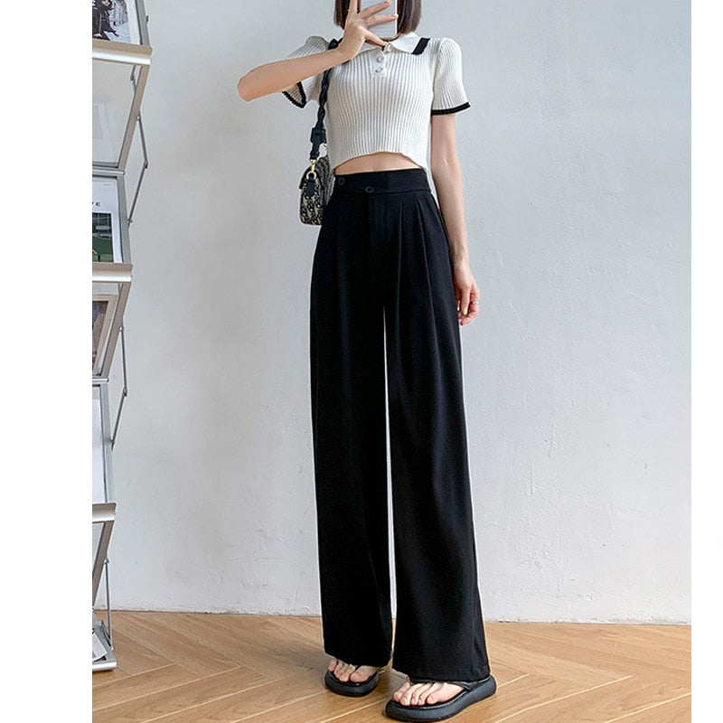 Modern high-waist wide-leg fashion trousers for women, ideal for a chic casual look.