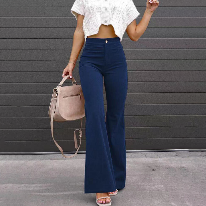 Chic women's wide-leg flared trousers, high-waist design in soft organic corduroy for versatile outfits.