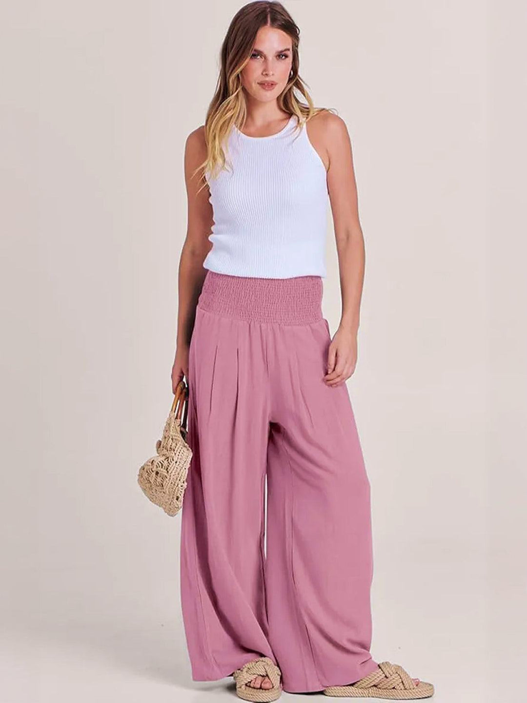 Spring fashion women's wide leg pants, high waist with smocked detailing, versatile style.