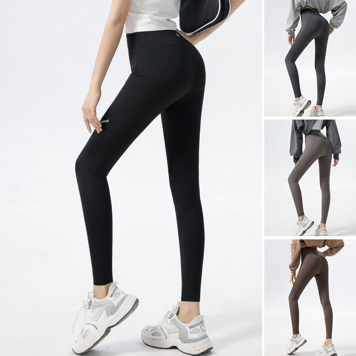 Comfortable women's fitness leggings with a unique alphabet shark print, high-waisted for yoga.