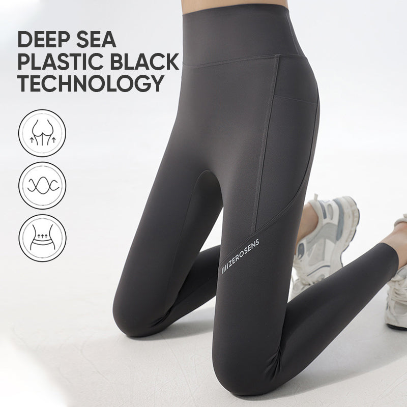 Alphabet shark print activewear leggings for women, moisture-wicking and high-waisted for yoga.