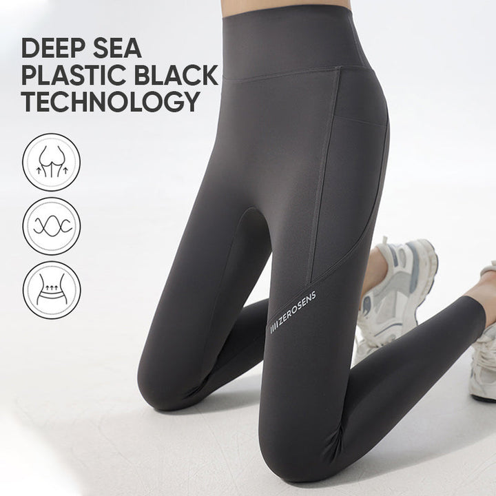 Alphabet shark print activewear leggings for women, moisture-wicking and high-waisted for yoga.