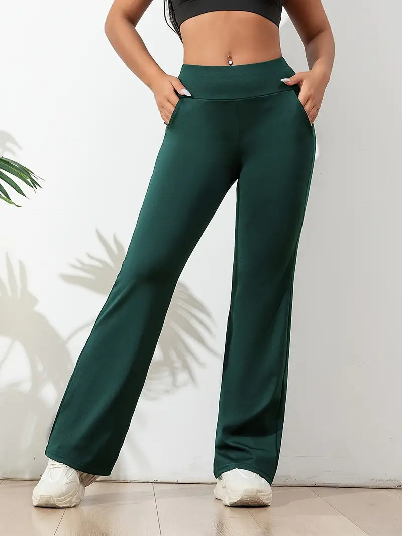 Flared high-waisted women's active pants in blue, offering a comfortable stretch fit for workout & everyday wear.