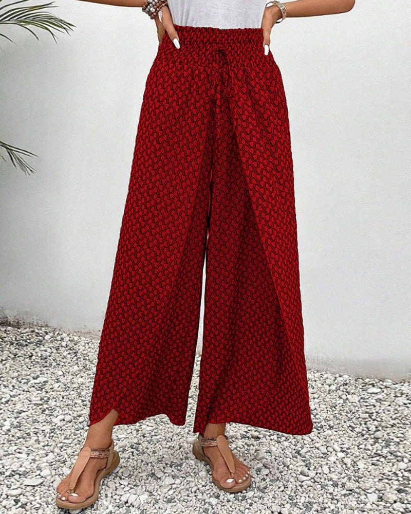Comfortable high-waisted geometric print wide-leg trousers, perfect for elegant office wear or casual spring outfits.