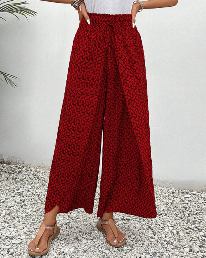 Comfortable high-waisted geometric print wide-leg trousers, perfect for elegant office wear or casual spring outfits.