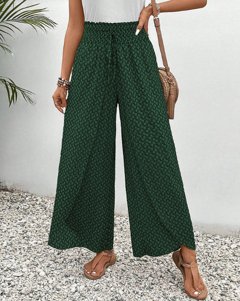 Modern women's high-waisted wide-leg trousers, featuring a unique geometric pattern for versatile fashion.