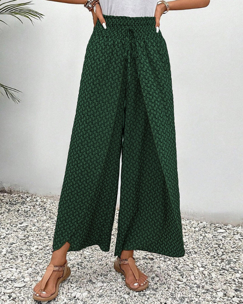 Women's high-waisted wide-leg geometric pattern trousers. Elegant & comfortable for modern office or casual wear.