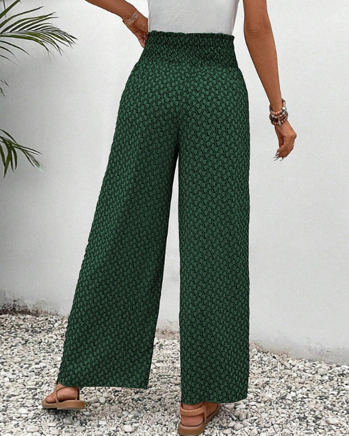 Spring/summer women's high-waisted geometric print trousers, wide-leg design offers comfort & modern style.