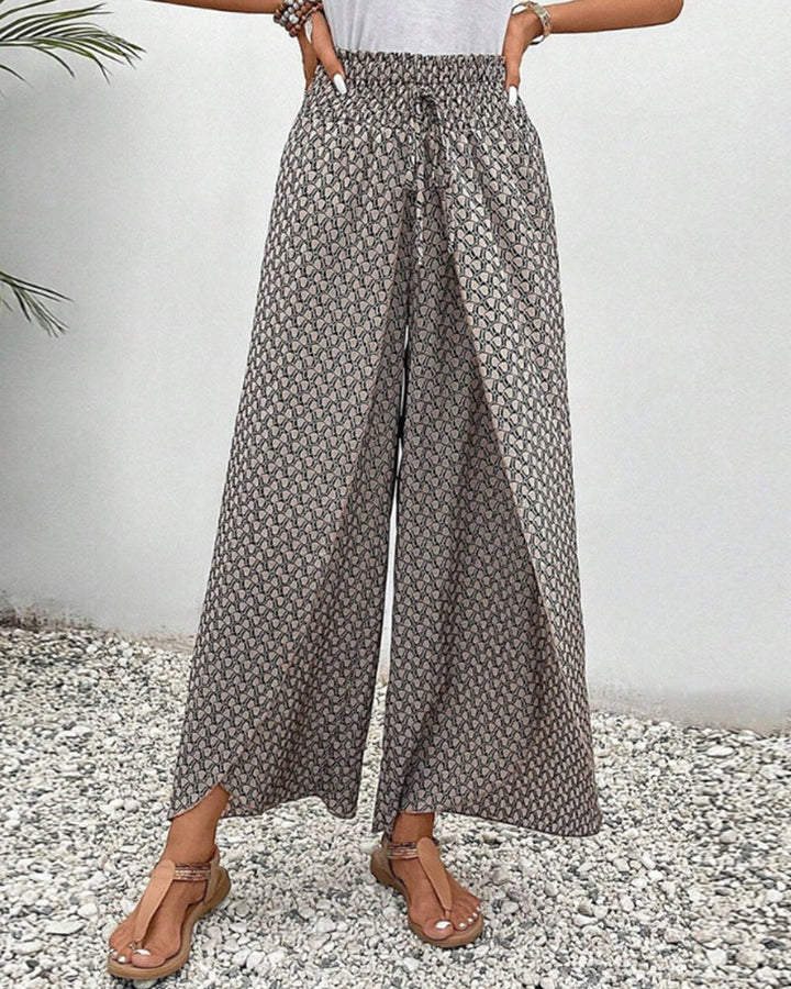 Women's high-waisted wide-leg trousers with a stylish geometric abstract pattern, comfortable for all seasons.