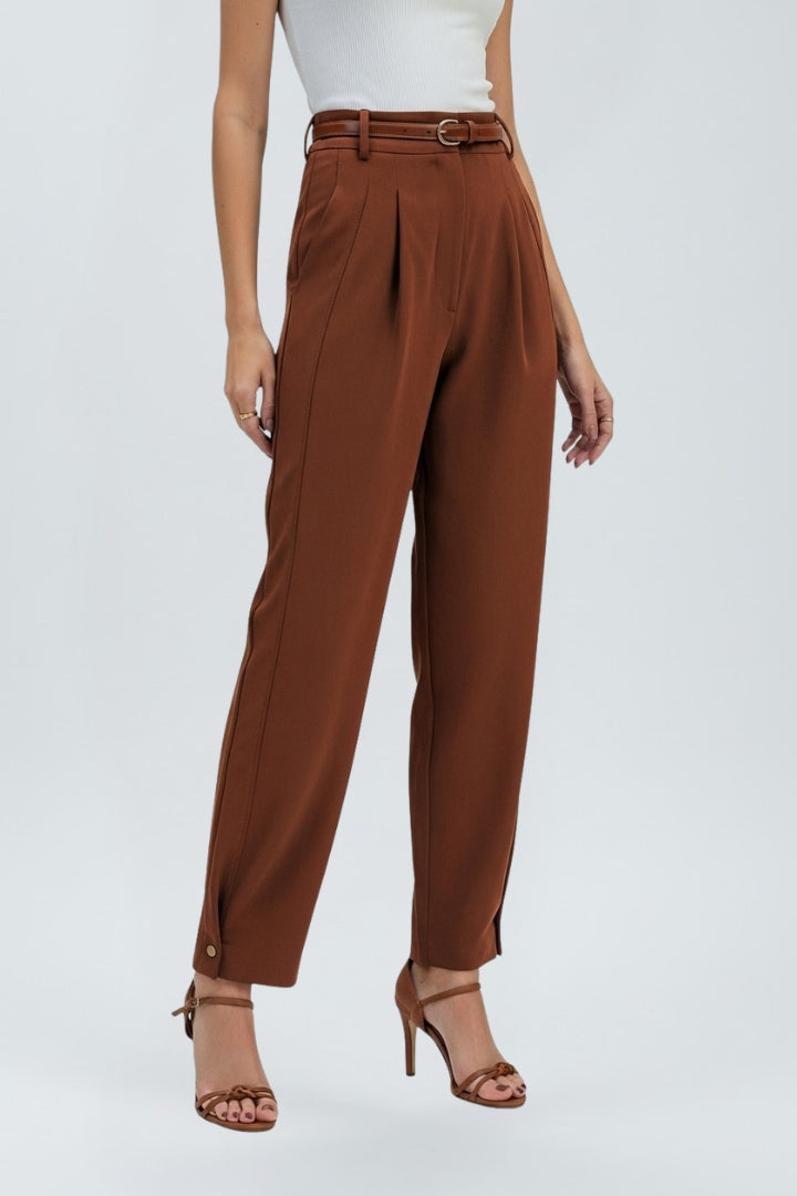 Full-length view of women's high-waisted tapered pants, a modern take on classic formal trousers.