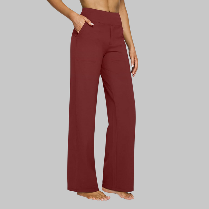 Women's high-waisted wide-leg pants featuring side pockets, designed for versatile and chic styling.
