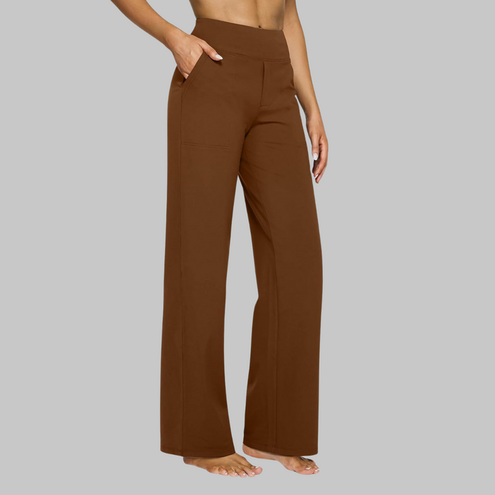 Smart casual women's wide-leg pants, high-waisted, with practical pockets for effortless elegance.