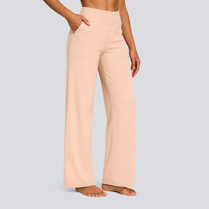 Comfortable & chic women's high-waisted wide-leg pants with pockets, perfect for a modern fashion statement.