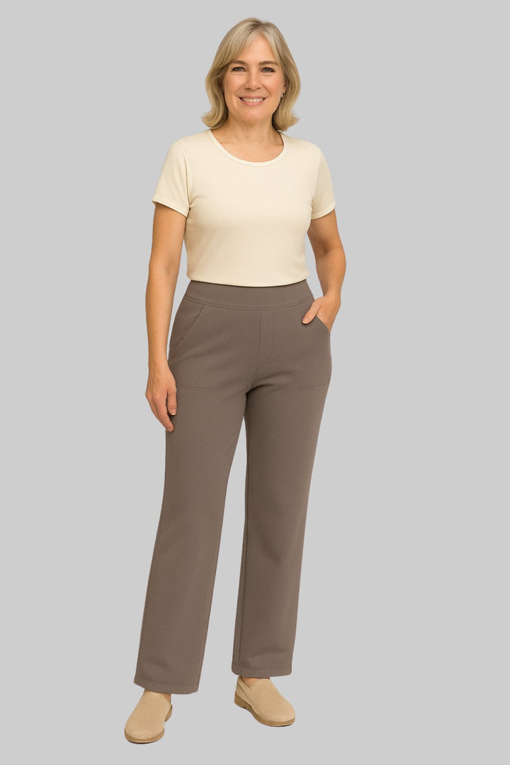 Relaxed fit women's high-waisted wide-leg pull-on pants with convenient pockets for casual style.