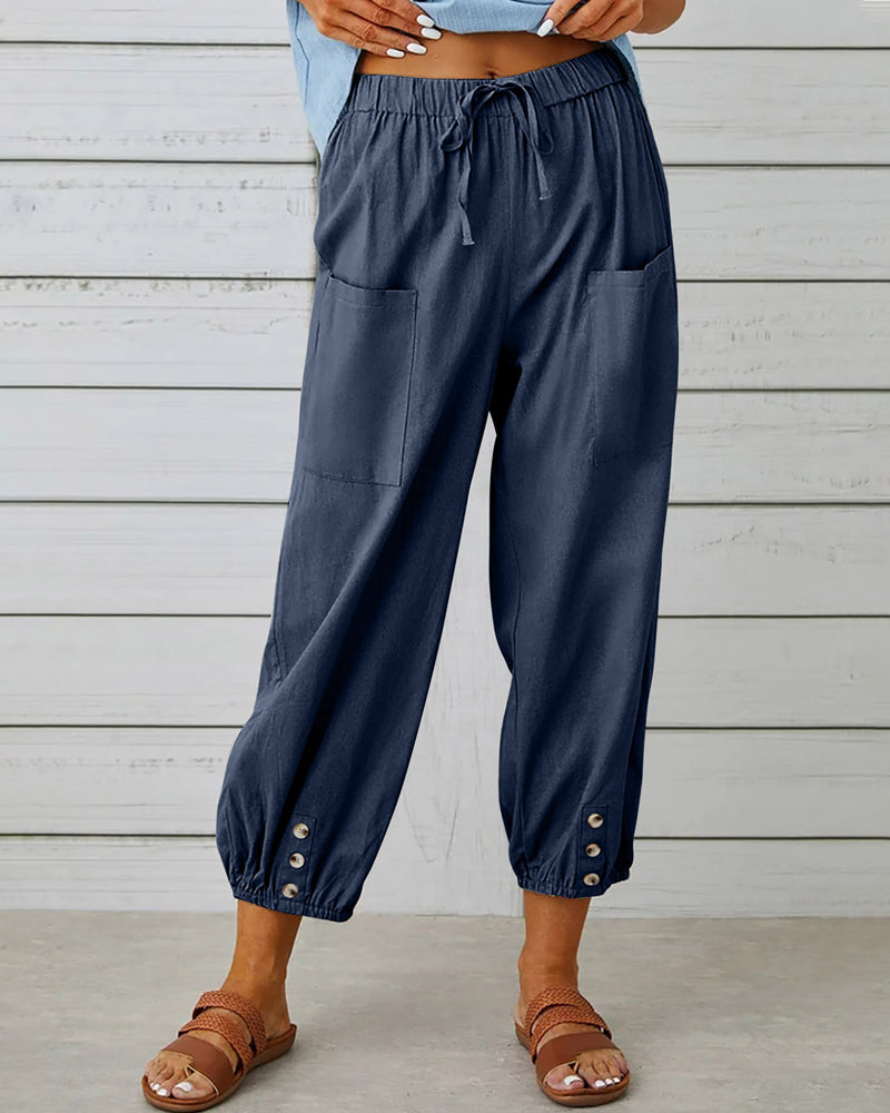 Women's high-waisted wide leg trousers in a flowing fabric for elegant style. Perfect for versatile fashion.
