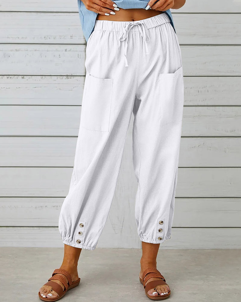 Versatile high-waisted wide leg trousers for women. Elegant and loose-fitting, perfect for any outfit.