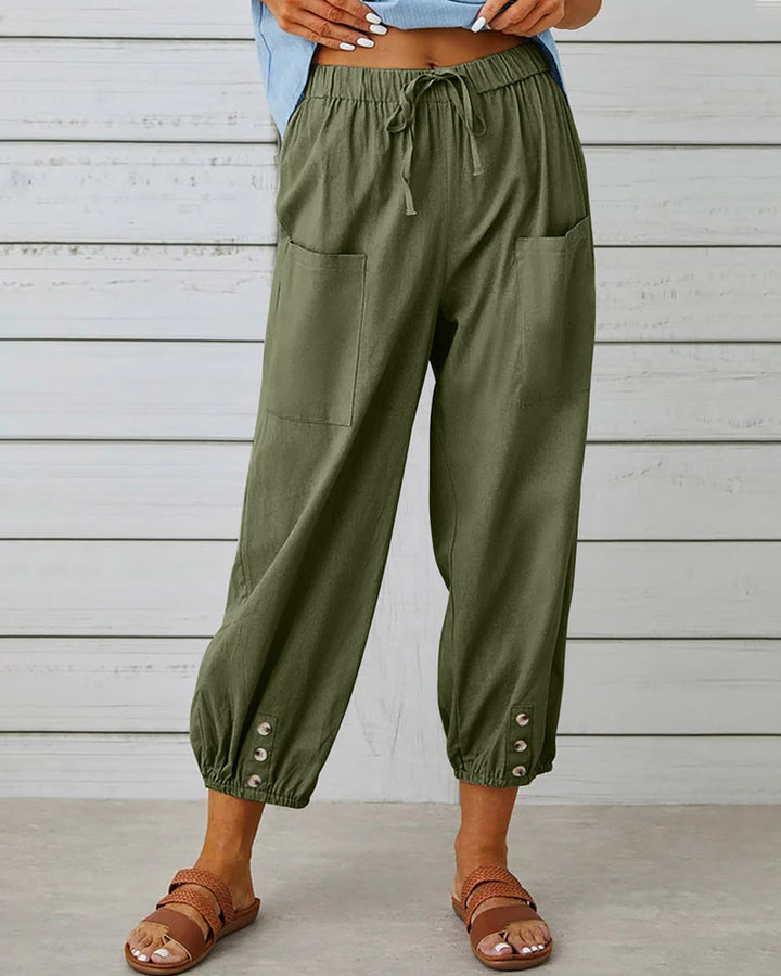 Olivia high-waisted wide leg trousers for women, offering effortless elegance, comfort, and a loose fit.