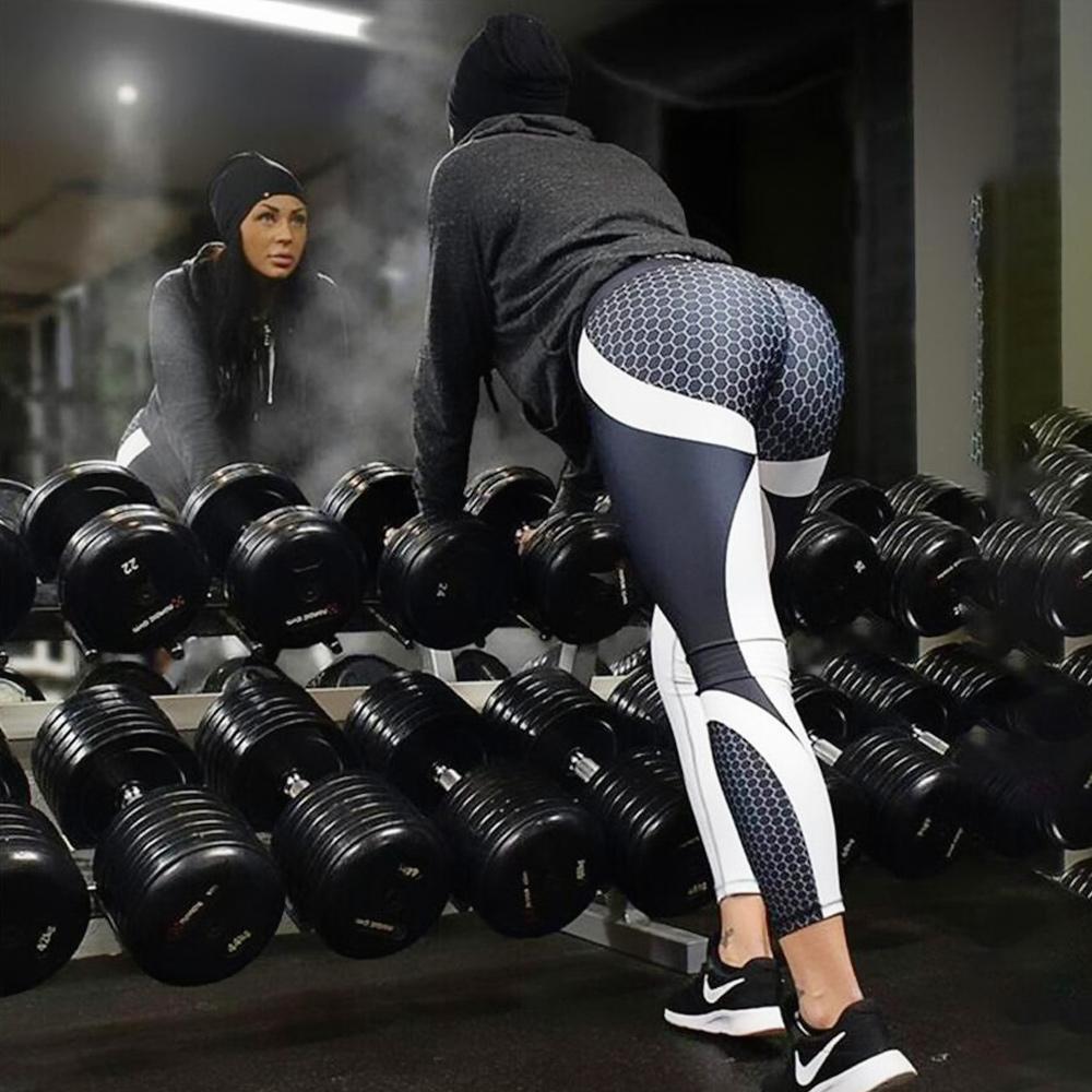 Close-up: Detailed geometric pattern on women's high-waist yoga leggings, premium quality.