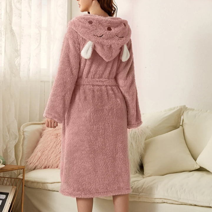 Plush women's hooded bunny ear bath robe. Cozy flannel comfort wear, perfect for after bath or home relaxation.