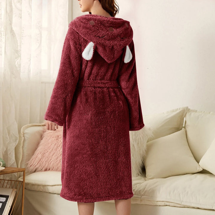 Stylish women's hooded bunny ear robe. Warm flannel loungewear for home comfort & relaxation.
