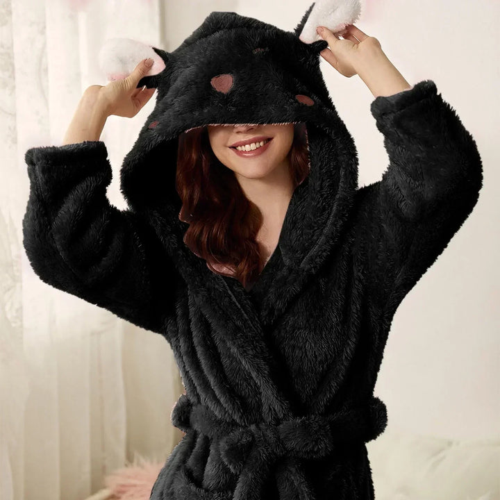 Ultra-soft women's hooded bunny ear bath robe. Flannel comfort wear for ultimate relaxation at home.