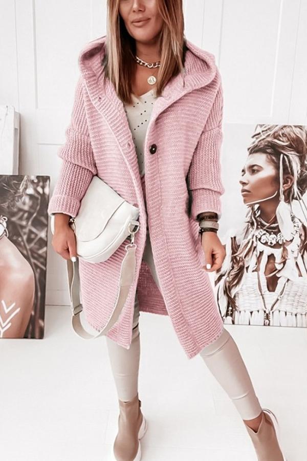 Soft hooded knitted vest for women, featuring a practical button-up front.