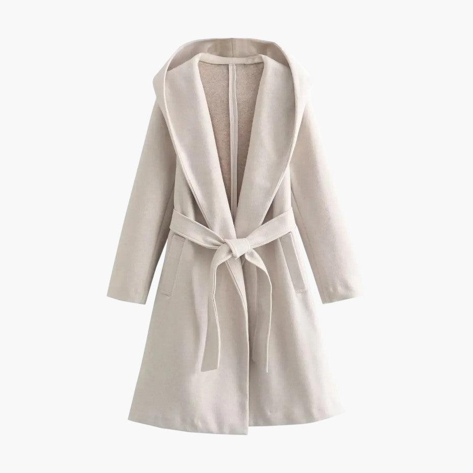Elegant women's long hooded trench coat. Belted waist and button-front details for versatile styling.