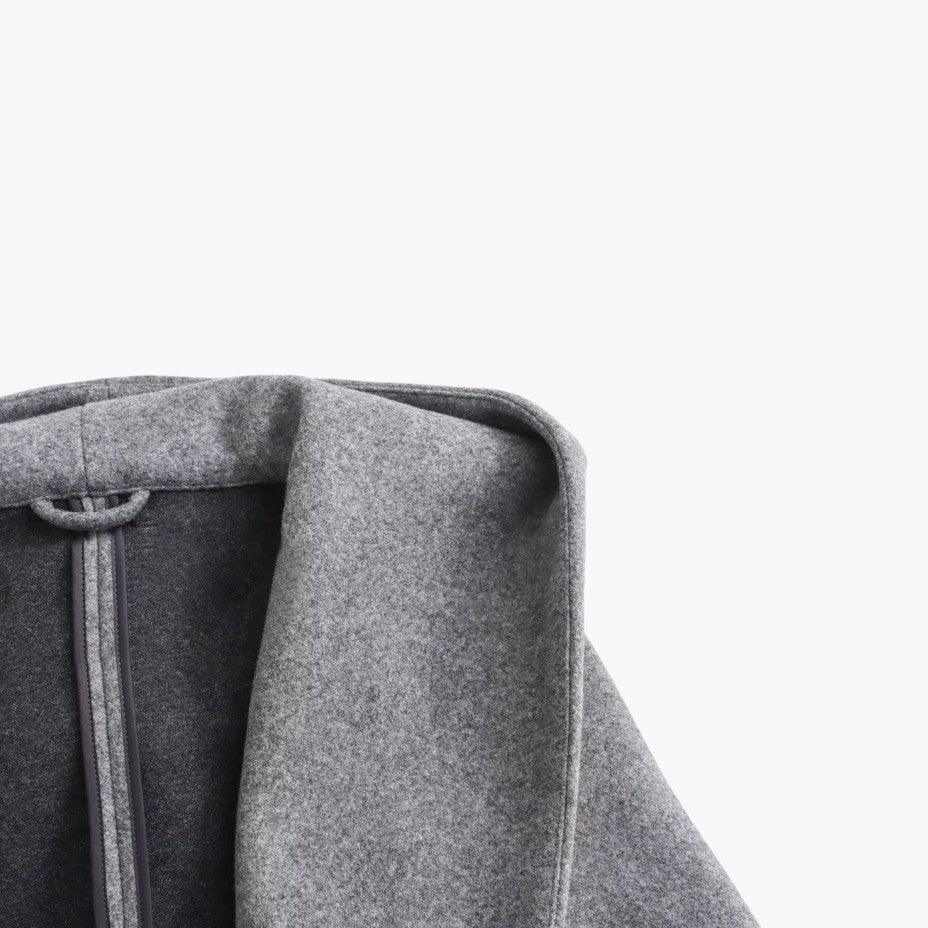 Stylish women's hooded trench coat with a belted waist. A versatile button-front jacket for fall & spring.