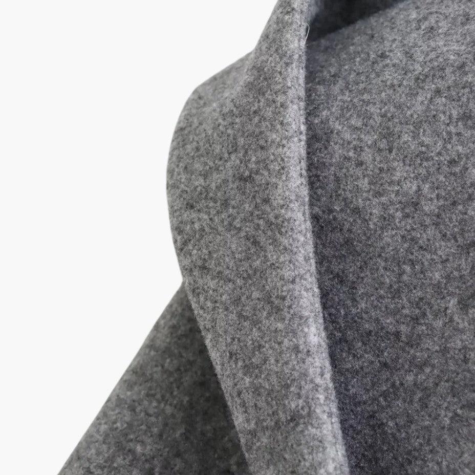 Women's hooded trench coat for fall fashion. Features a belted waist & practical button-front design.
