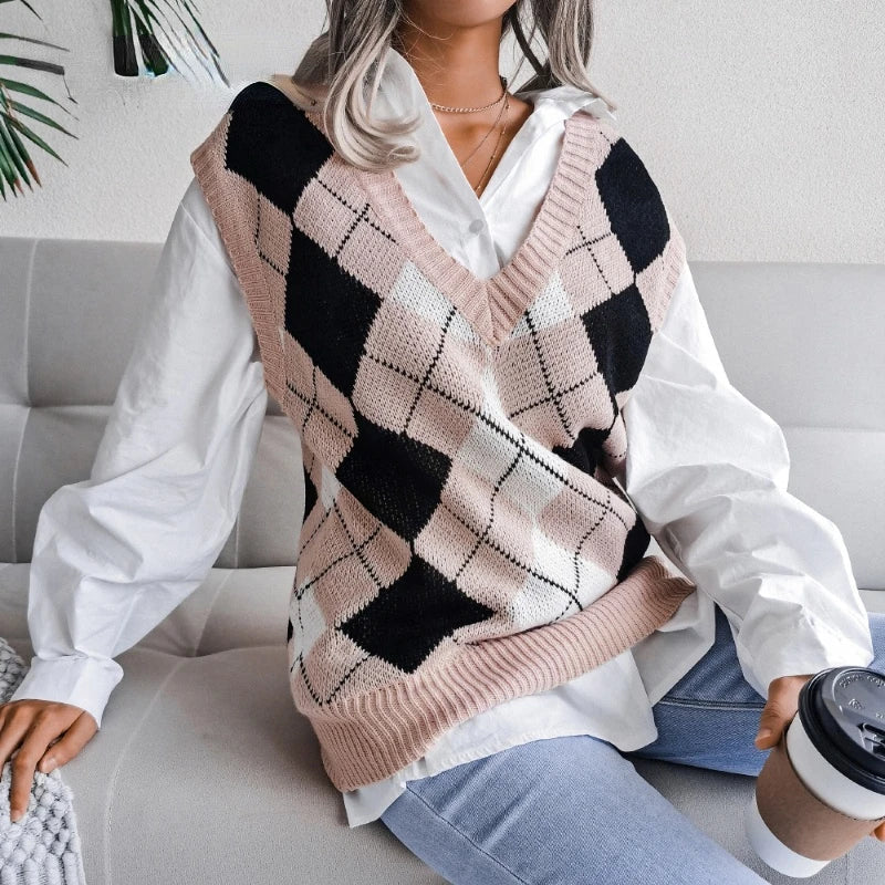 Cozy women's houndstooth knit sleeveless vest, loose fit, ideal for winter layering.