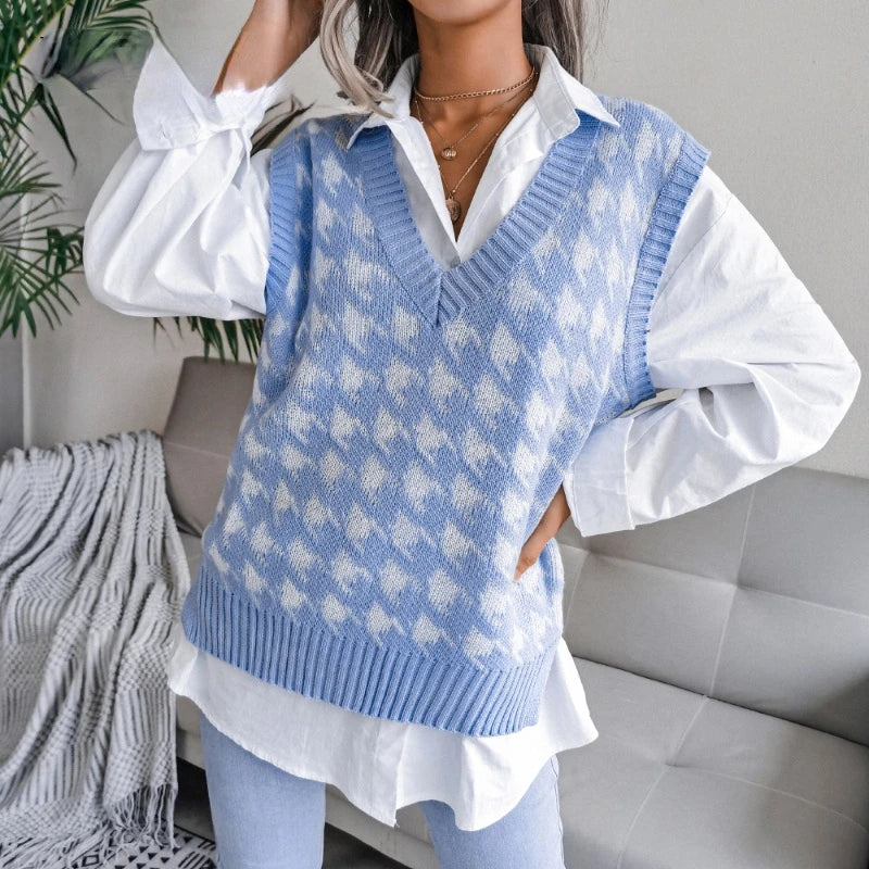 Chic women's houndstooth knit waistcoat, elegant sleeveless top for sophisticated winter wear.
