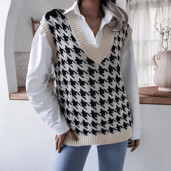 Front view: Women's houndstooth knit vest top, sleeveless, V-neck, perfect for layering.