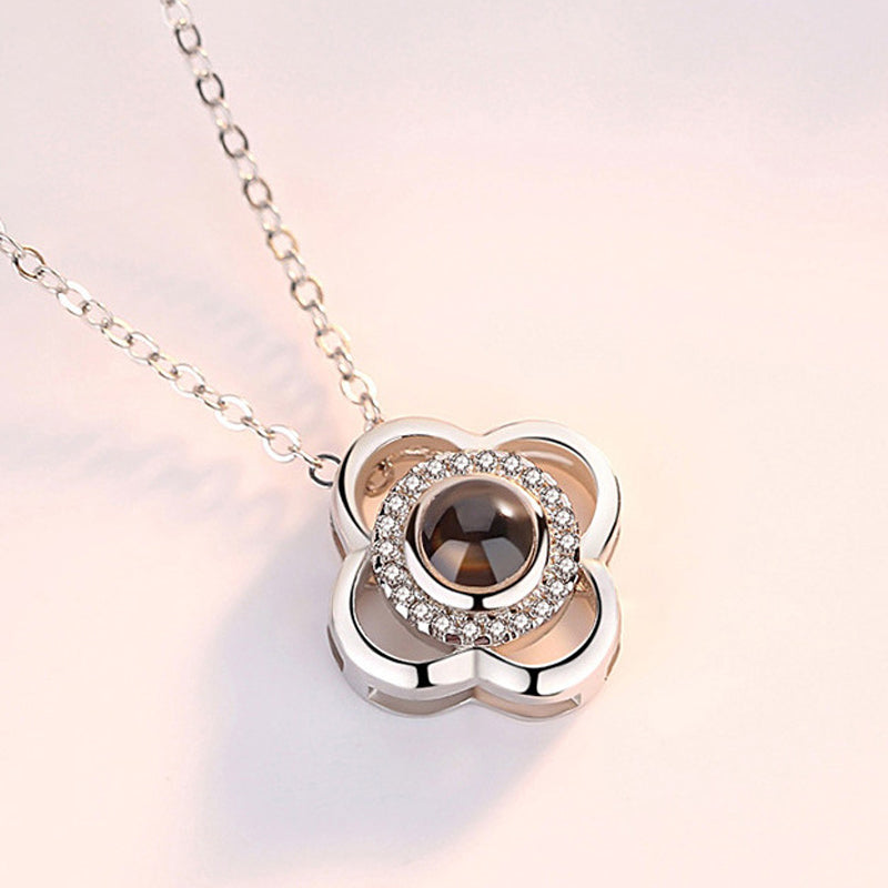 Silver 'I Love You' projection necklace, a durable alloy piece with a highly detailed pendant.