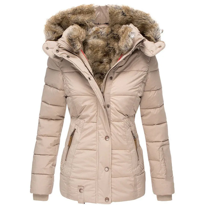 Warm women's heavy winter jacket. Insulated for cold weather, a cozy and stylish snow coat.