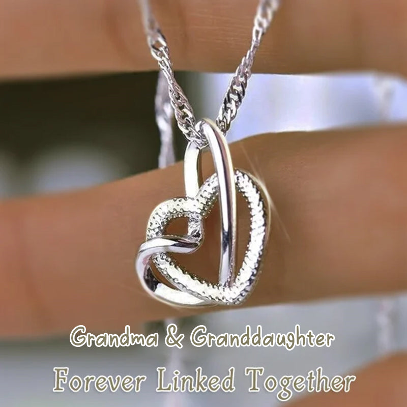 Adjustable alloy necklace with two interlocking hearts, ideal women's family jewelry gift.