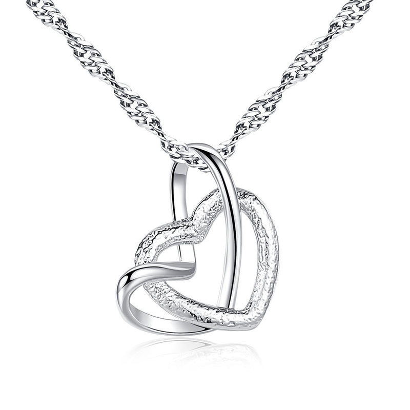 Gift-ready interlocking heart necklace, a touching symbol for grandma & granddaughter.