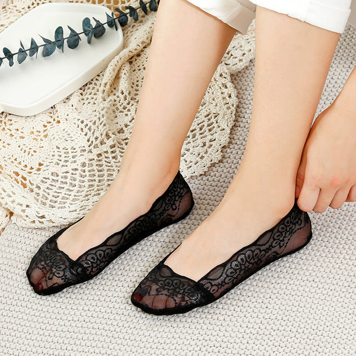 Floral lace women's liner socks, no-show, providing comfort and preventing slips.