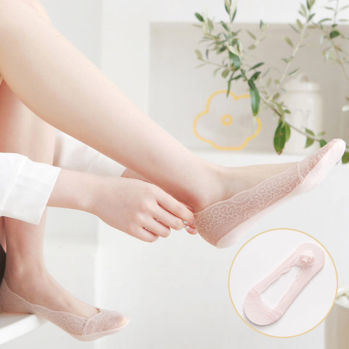 Everyday women's liner socks featuring intricate lace, designed to be invisible under shoes.
