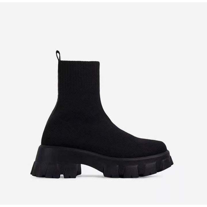 Comfortable women's platform ankle boots featuring a trendy chunky sole; great for urban street style.