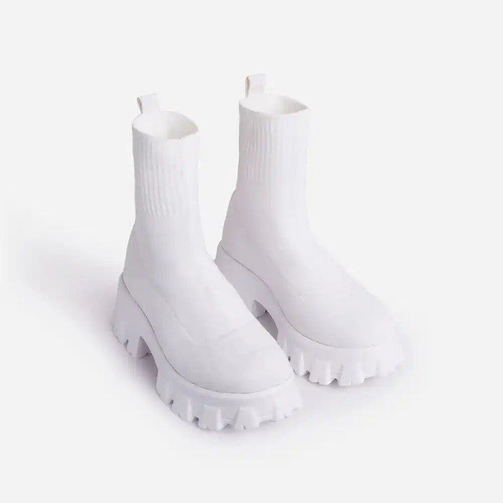 Women's robust chunky sole platform ankle boots, offering excellent grip & comfort for urban fashion.